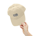 Beige MY$TOAR cap with 'NO PAIN NO GAIN' text, held by hand, luxury apparel accessory