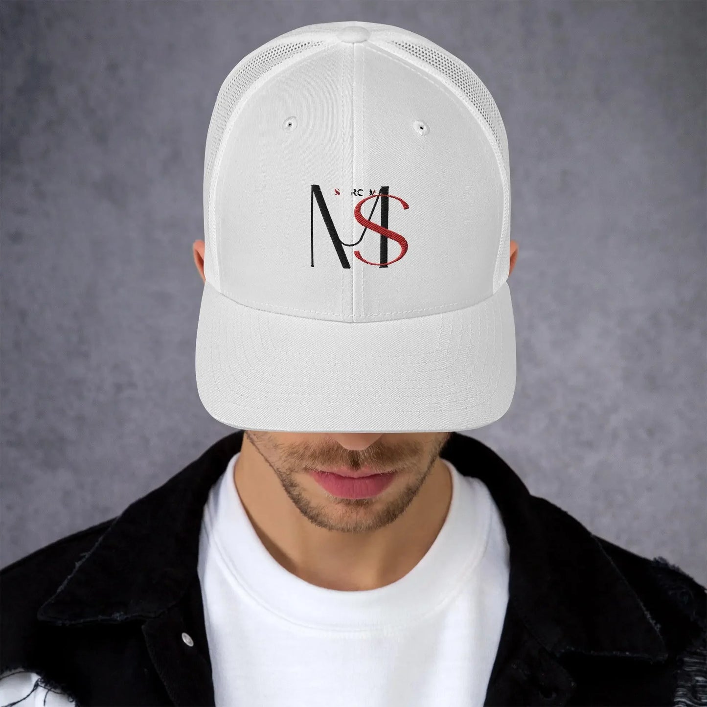 MY$TOAR luxury white retro trucker hat with black and red logo, worn by a man